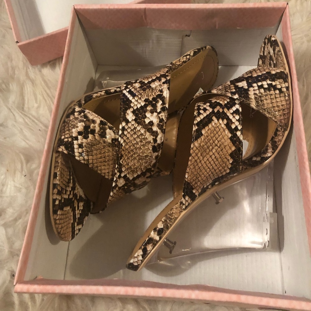 Snakeskin wedges with clear heel